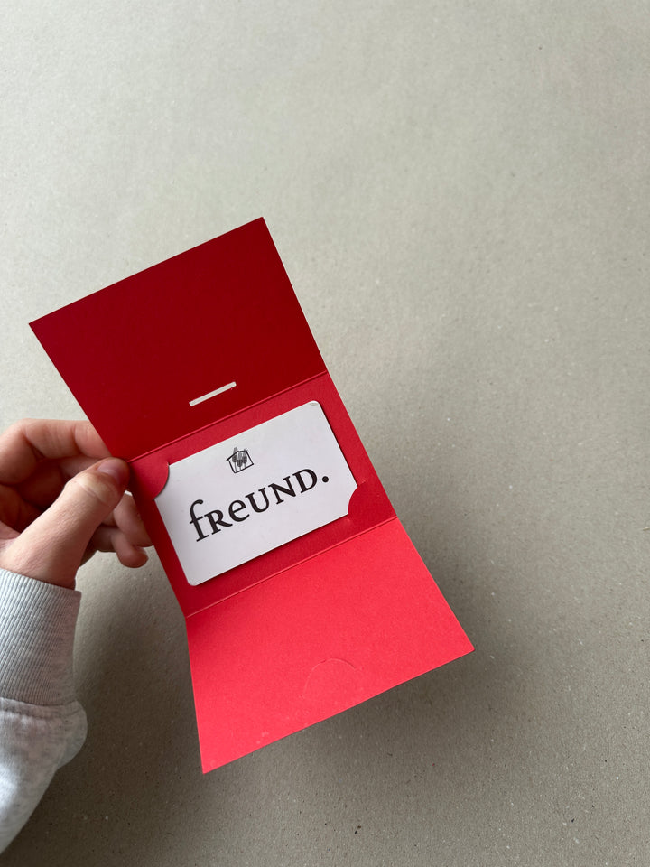 Rote Gutscheinhülle aus Karton – elegante Geschenkverpackung für Gutscheine